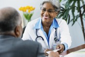 doctor and patient discussing papers