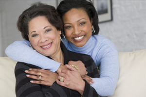 Mother and daughter Agents hug.